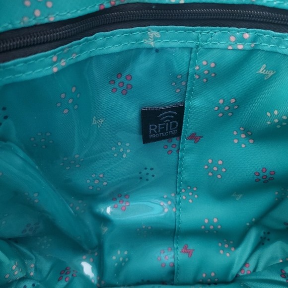 Lug Swivel Expandable Crossbody in Bloom Black with RFID Protection - Picture 10 of 16